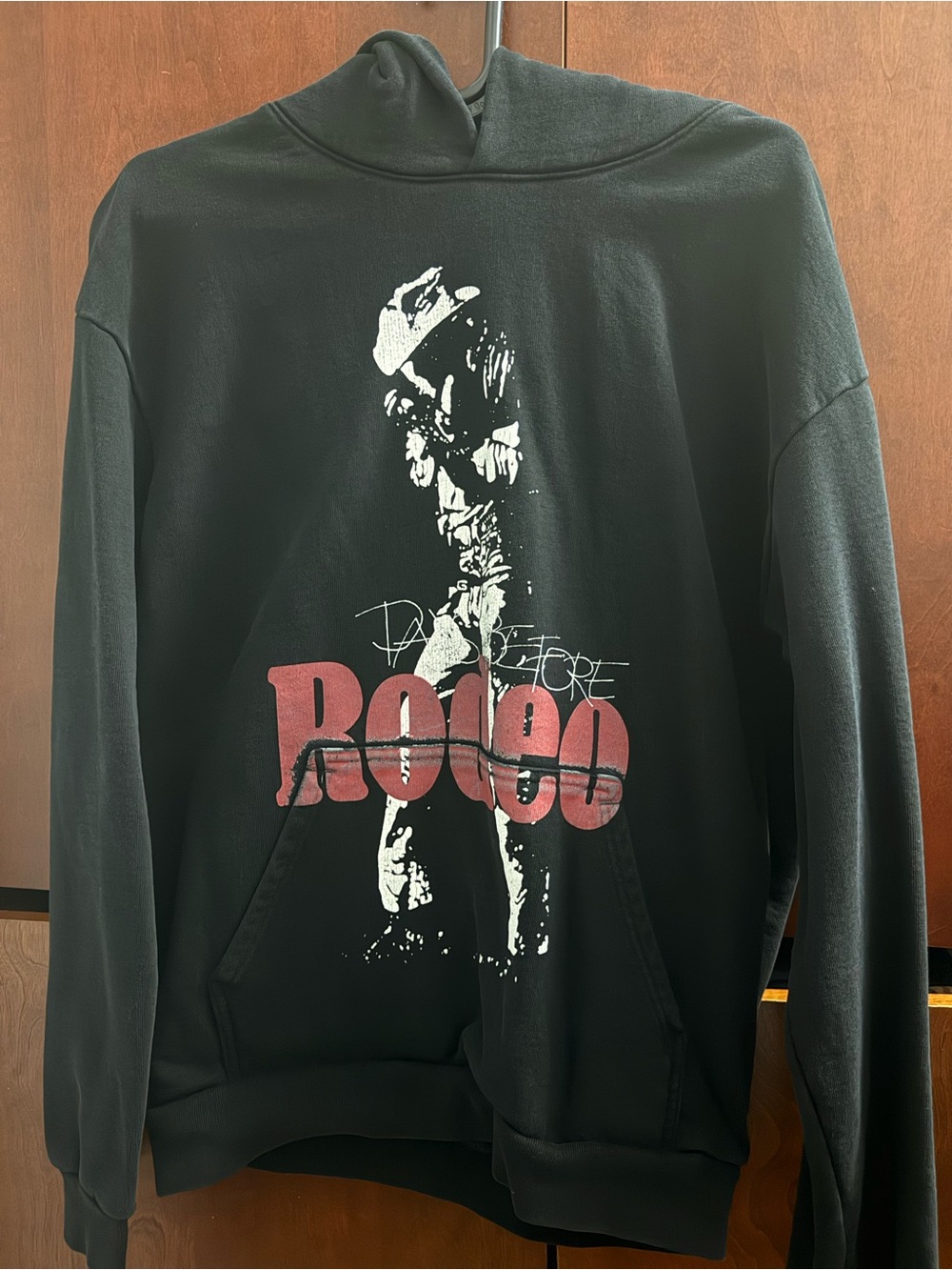 Travis Scott Black Crewneck with Pink-Red Rocco Graphic